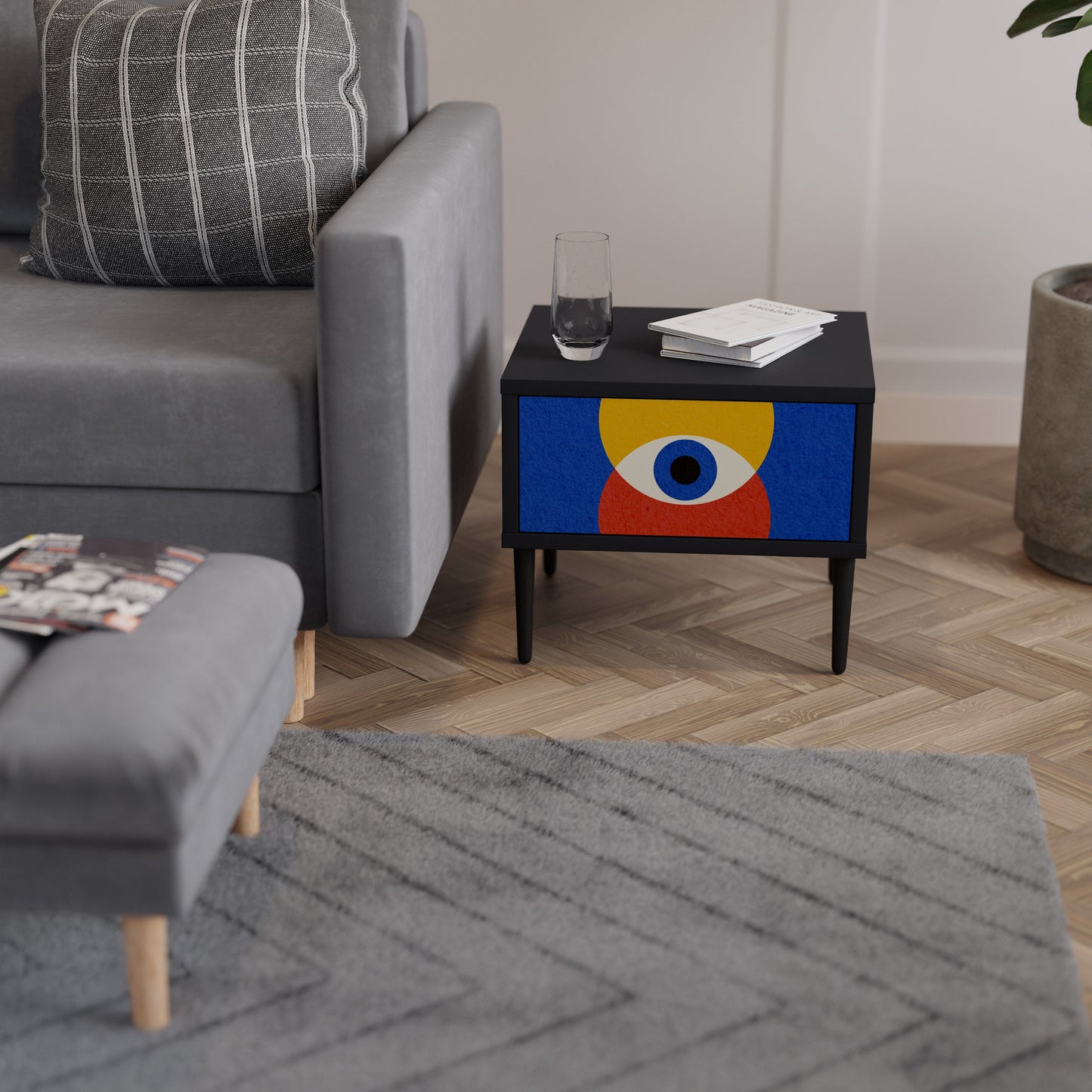 Nattduksbord med geometriska ögon i svart finish