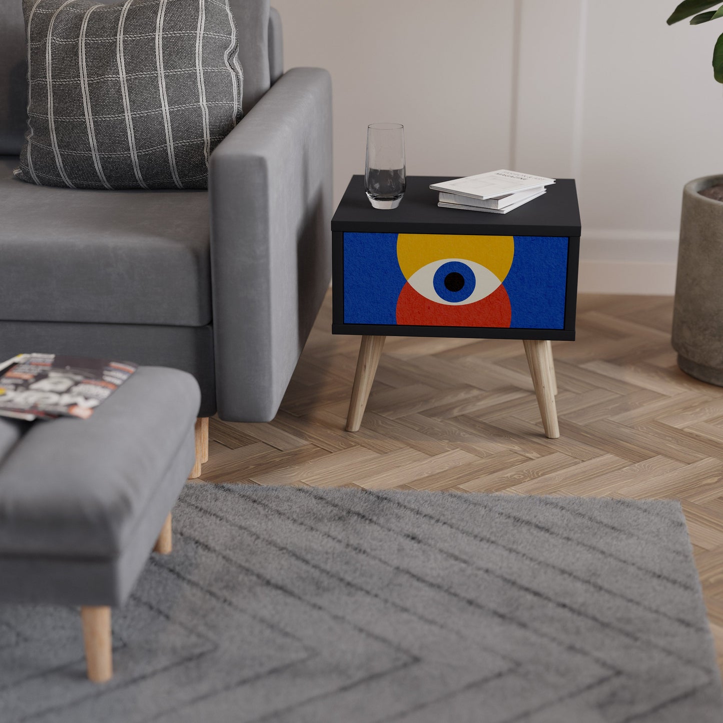Nattduksbord med geometriska ögon i svart finish