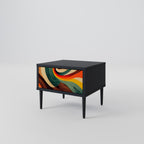 FÄRGGLADA STRANDS Nattduksbord i svart finish