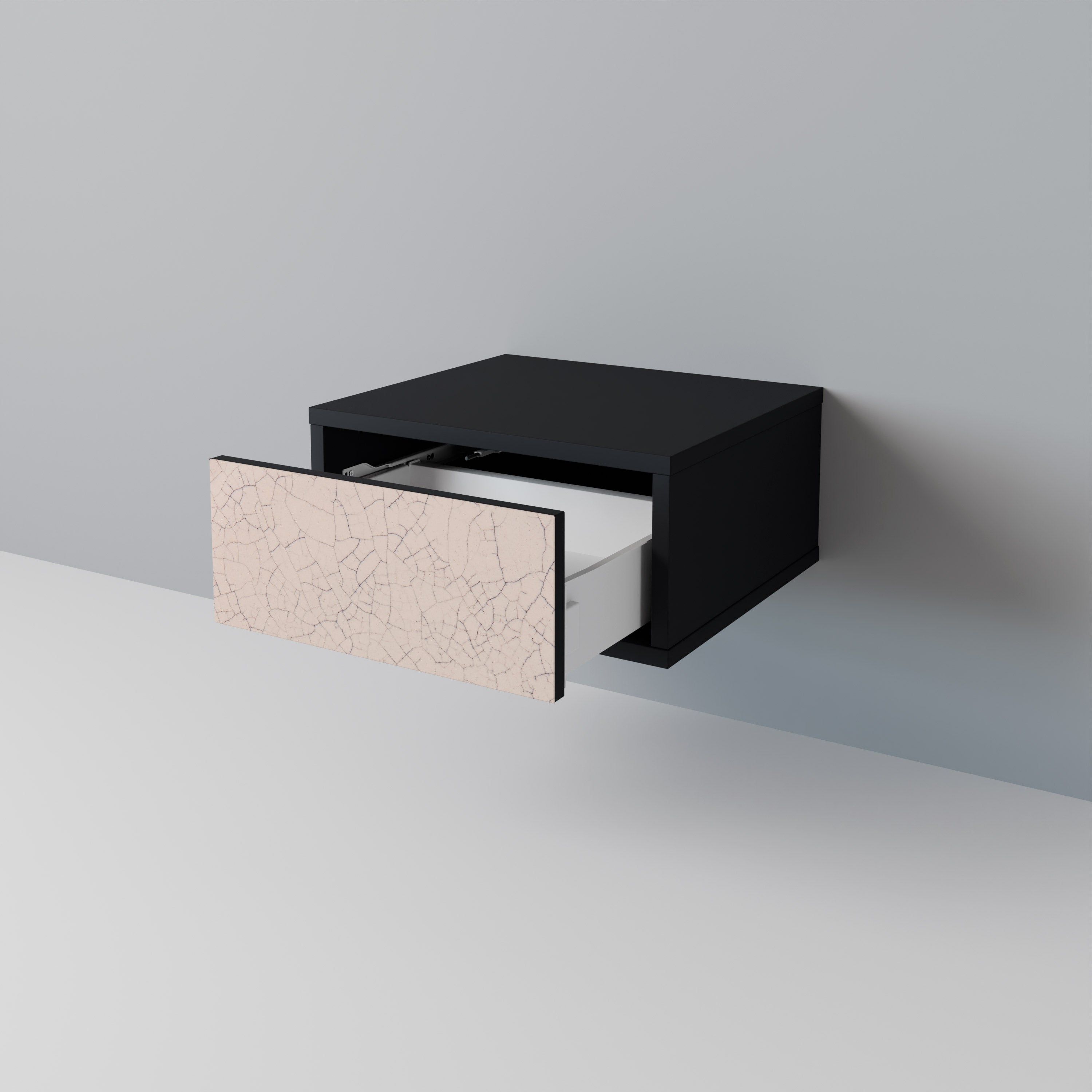 Nattduksbord i svart finish med keramisk textur