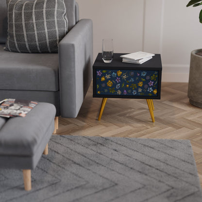 BLOMMOR PÅ MARINBLÅTT SJUKDAGSBORD i svart finish