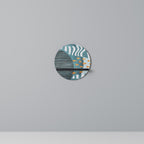 HÅLDA FORMER Rund konsthylla i svart finish