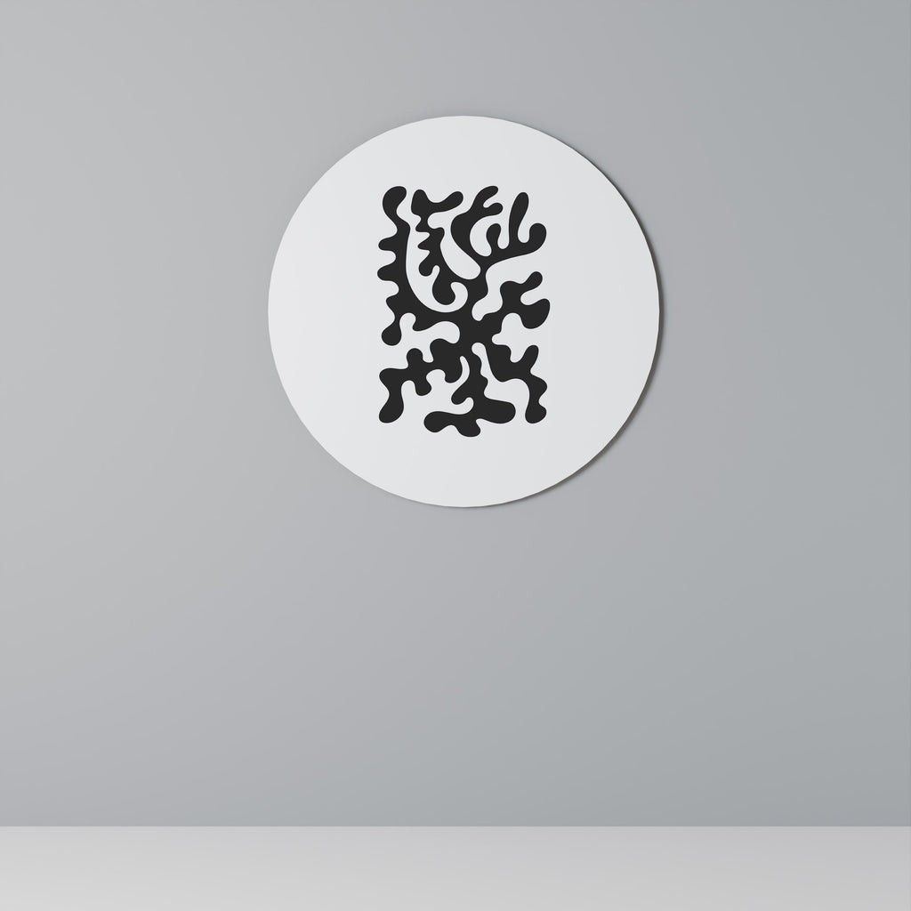 Rund väggdekoration med träkolsmönster