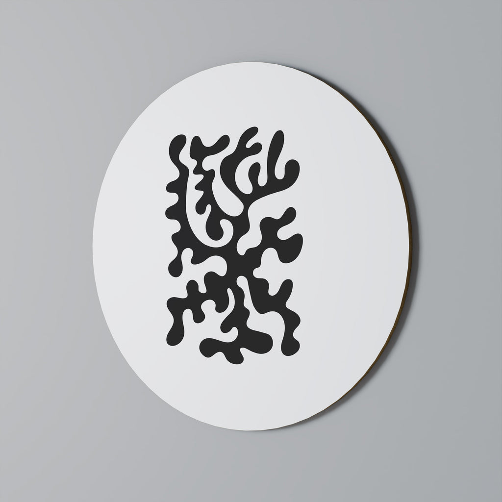 Rund väggdekoration med träkolsmönster