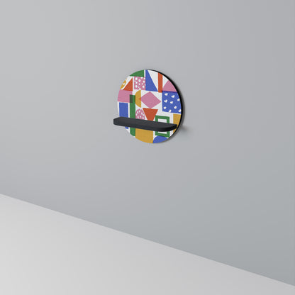 GEOMETRISK GLIMMER Rund konsthylla i svart finish