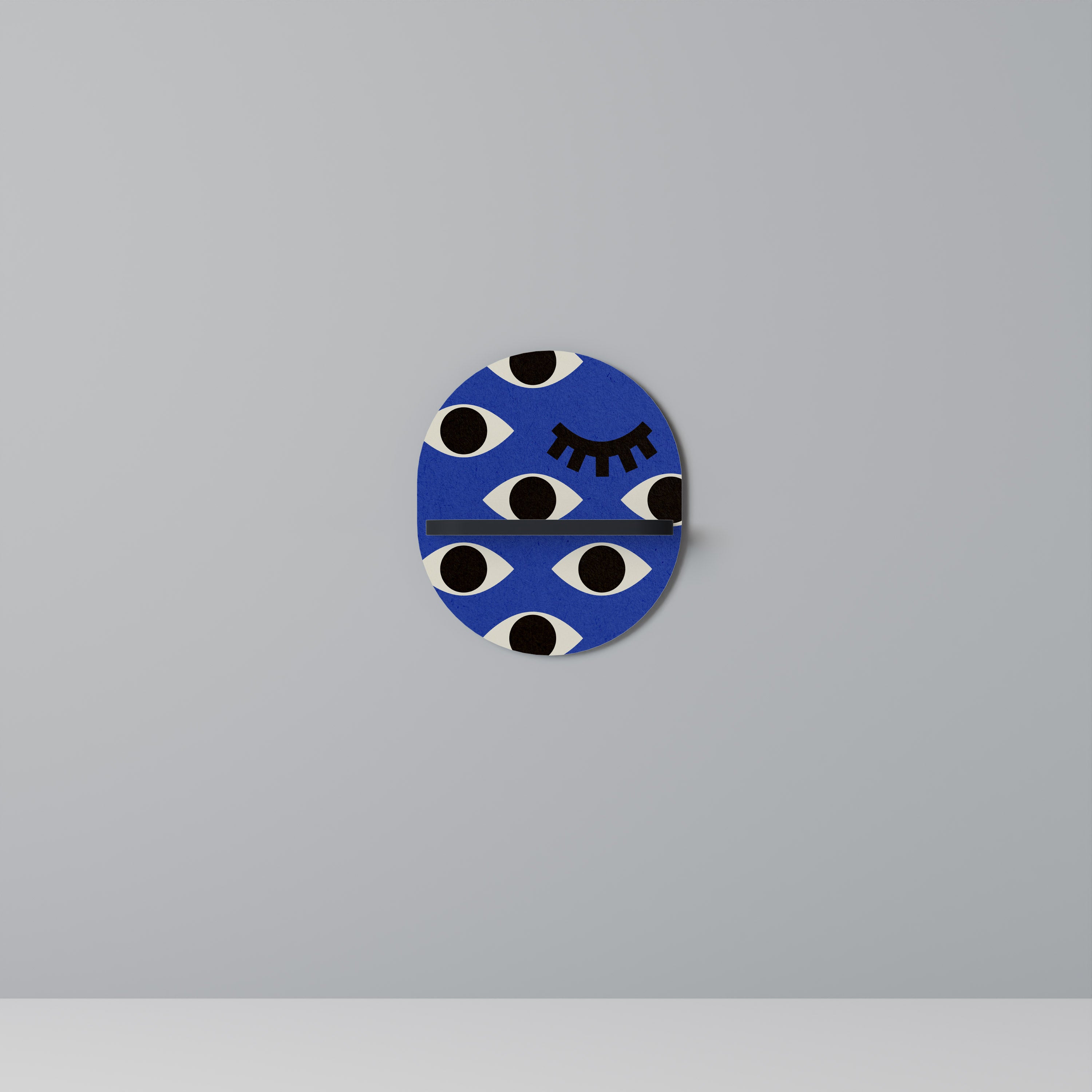 GEOMETRISKA ÖGON Oval konsthylla i svart finish