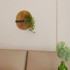 FÖRSTÄRKANDE RELATION Oval konsthylla i svart finish