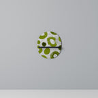 GRÖN RHAPSODY Oval konsthylla i svart finish