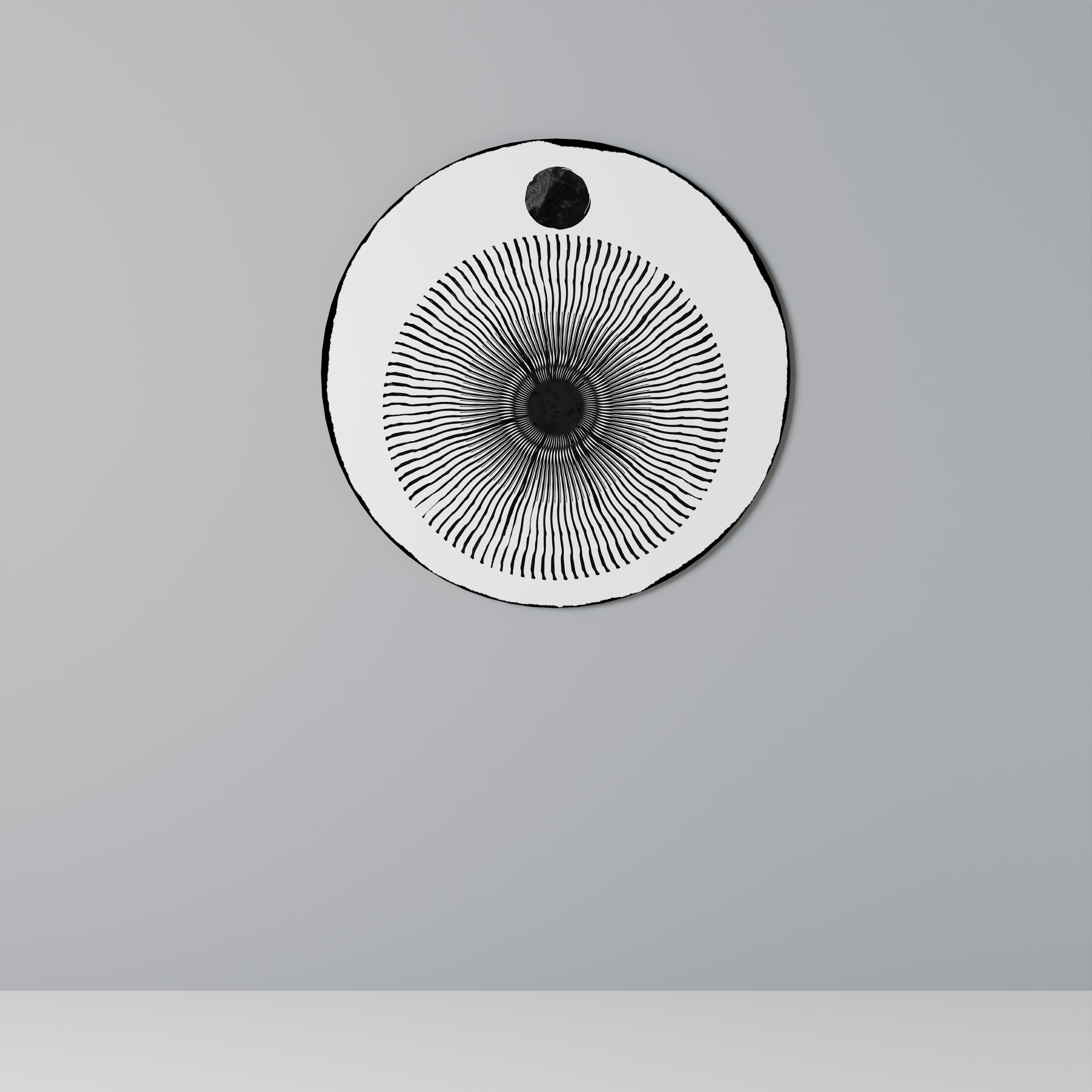 Rund väggkonst med mörkret kommer