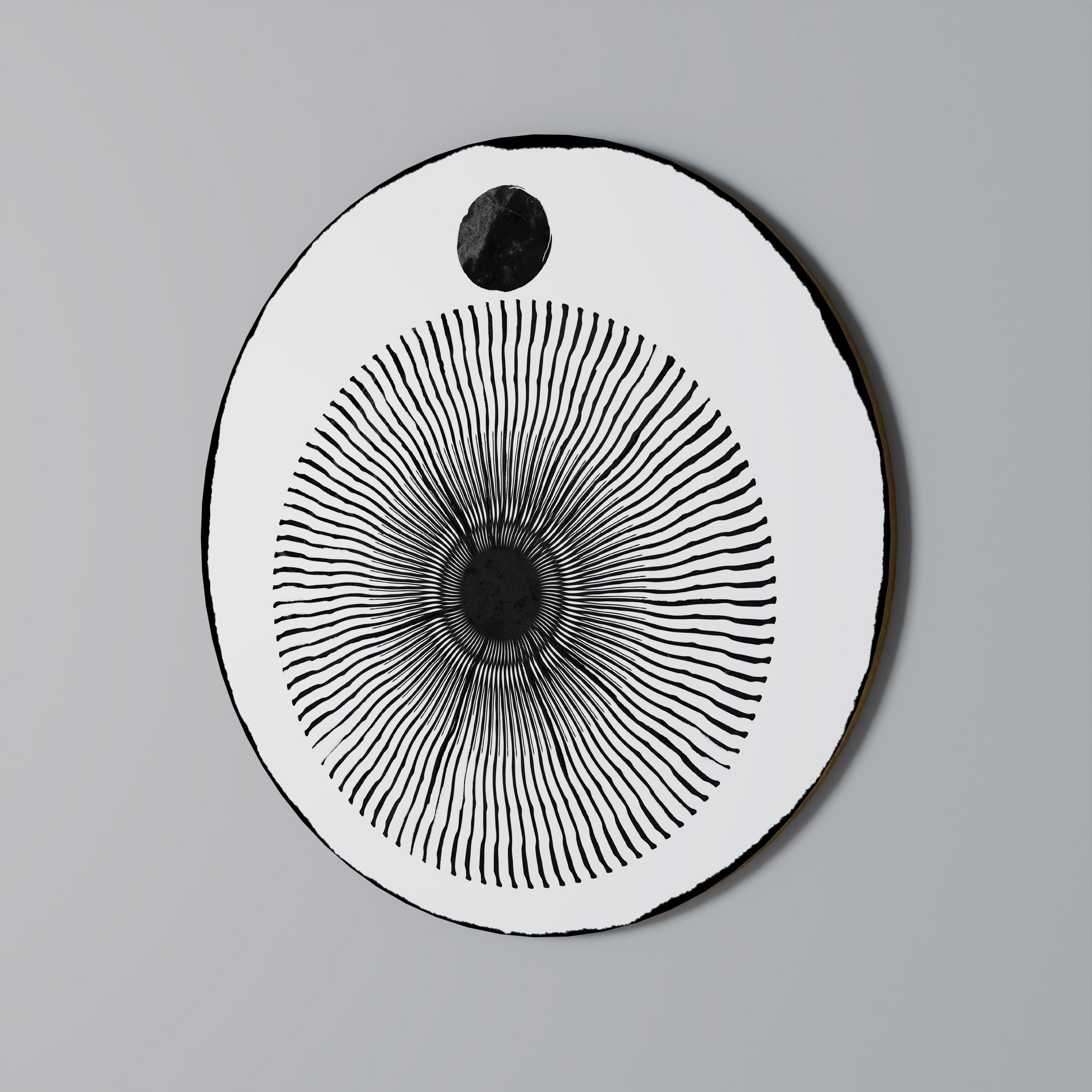 Rund väggkonst med mörkret kommer