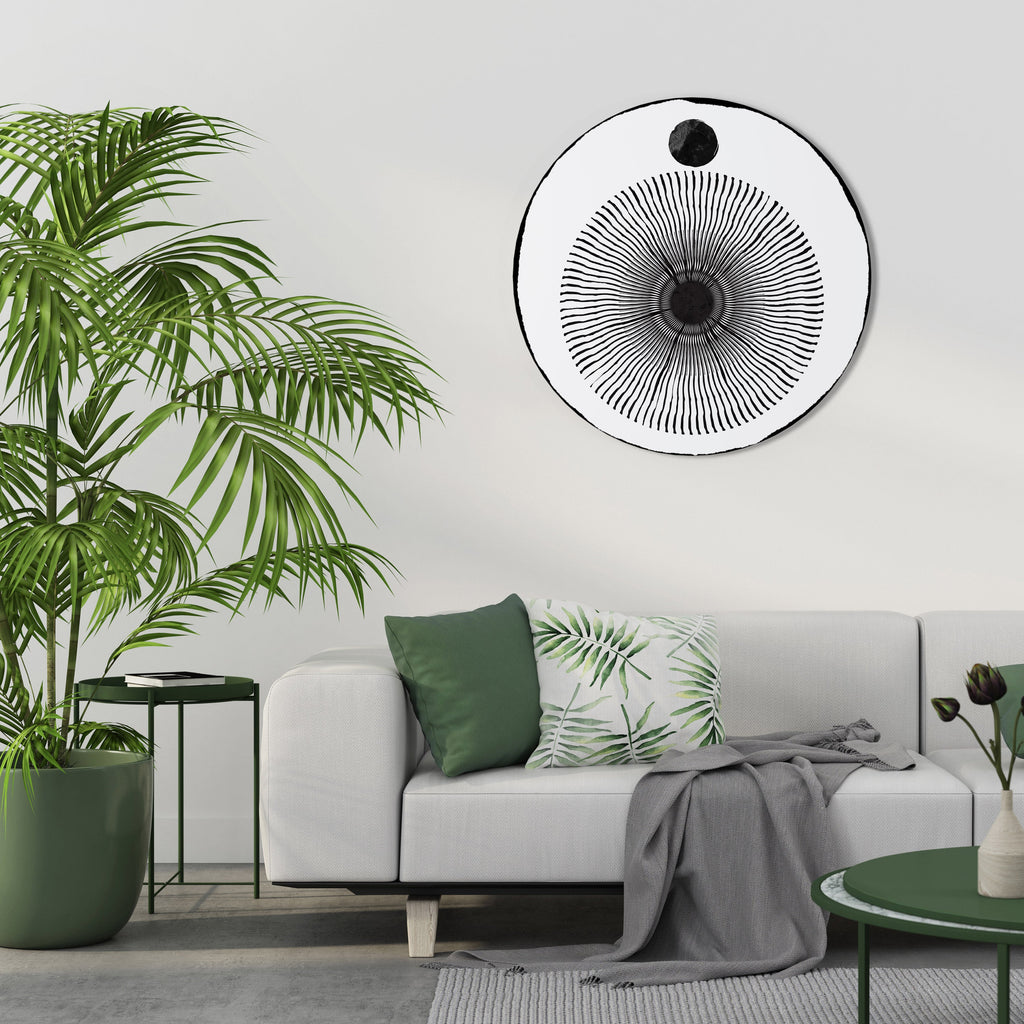 Rund väggkonst med mörkret kommer