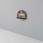 CHAMPENOIS IMPRIMEUR Rund konsthylla i svart finish