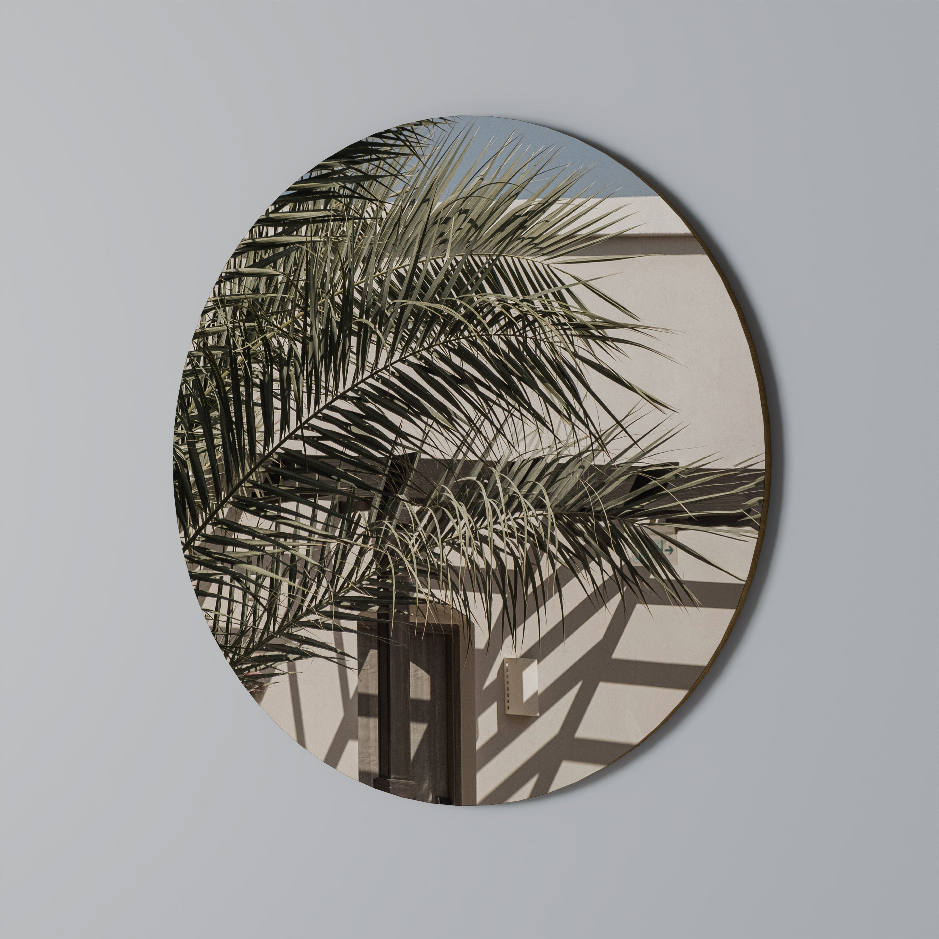 Rund väggdekoration med palmskugga och dans