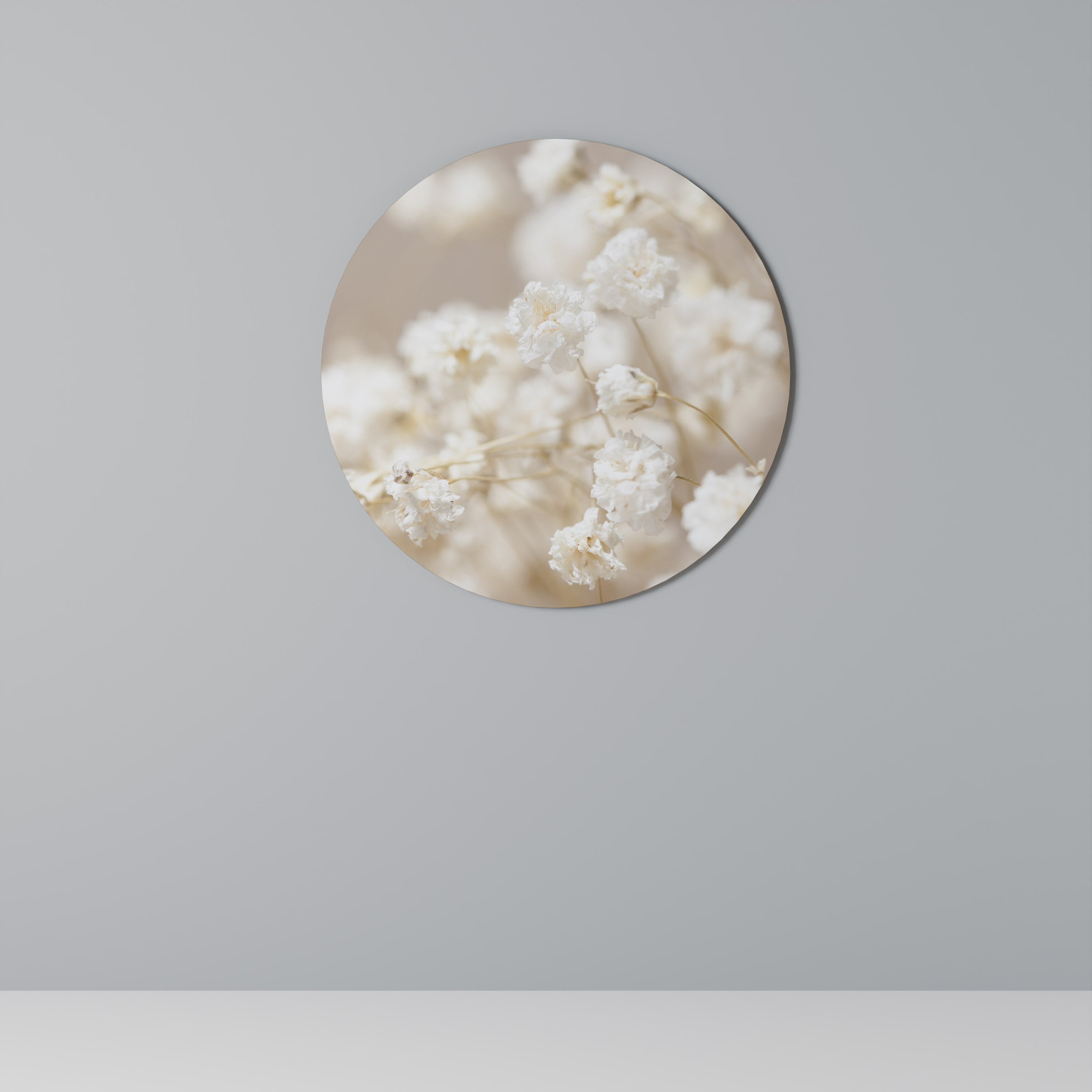 Rund väggdekoration med spöklik blomning