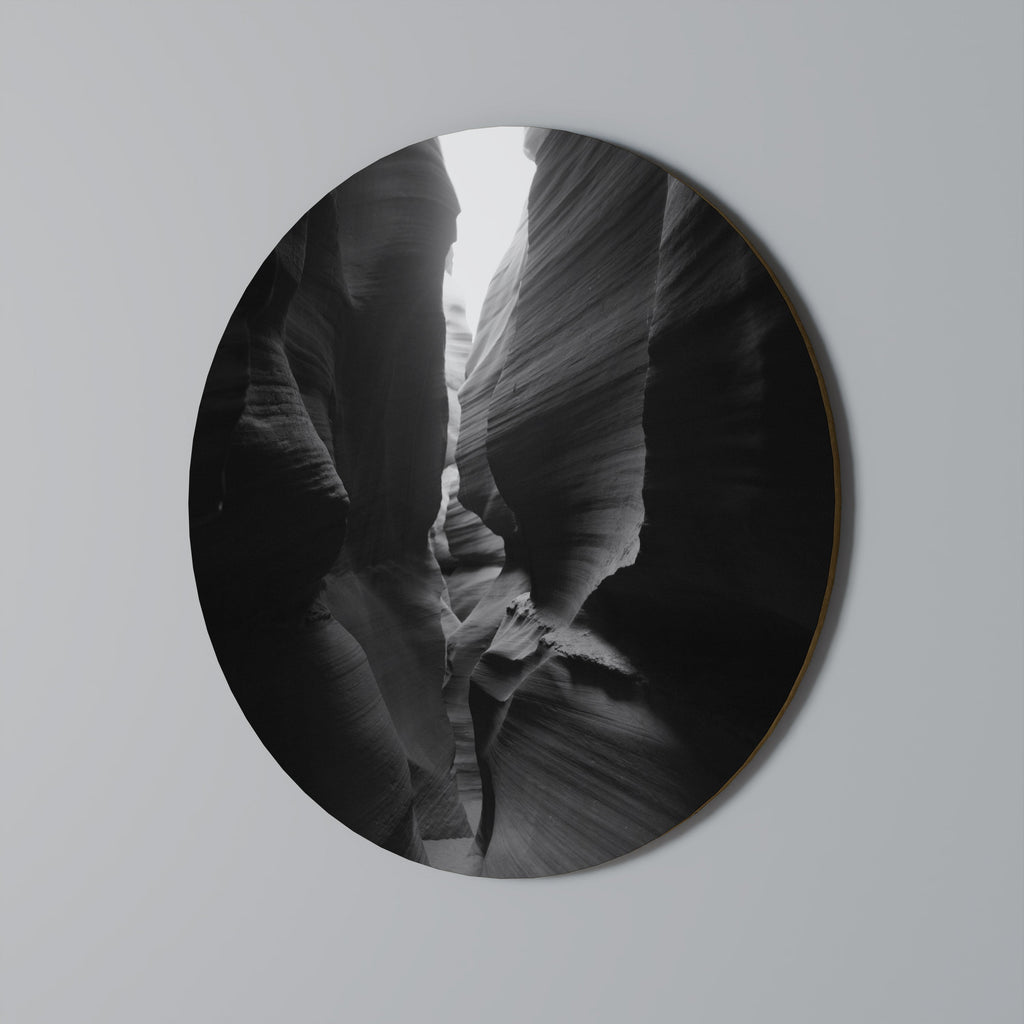 Rund väggkonst med TIDENS VISKANDE KANJON