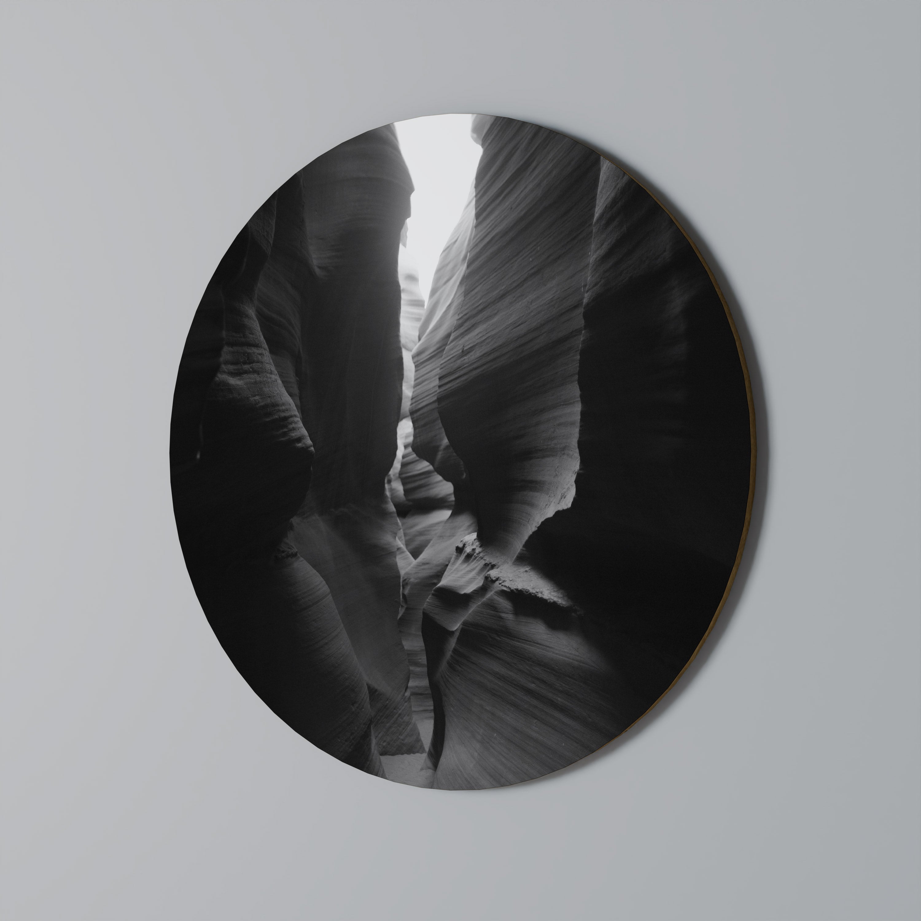 Rund väggkonst med TIDENS VISKANDE KANJON