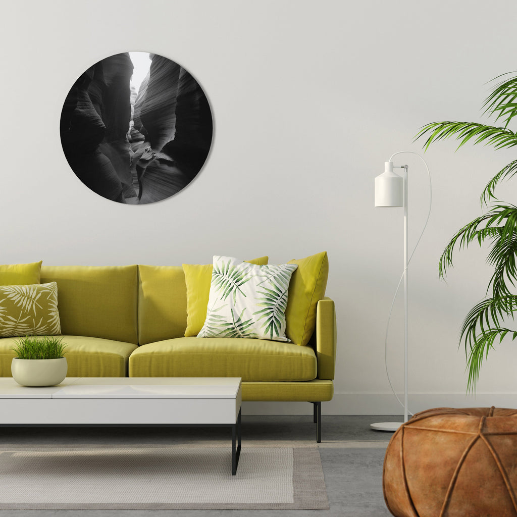 Rund väggkonst med TIDENS VISKANDE KANJON