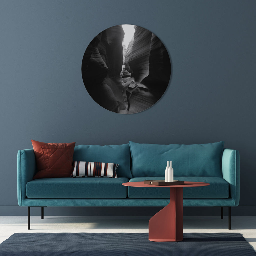 Rund väggkonst med TIDENS VISKANDE KANJON