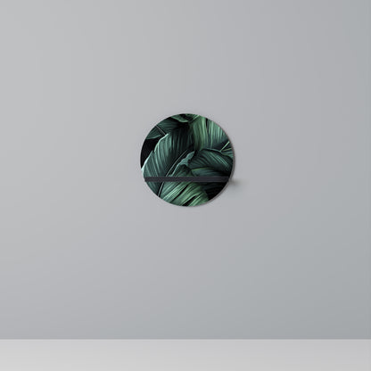 LEAFY ELEGANCE Rund konsthylla i svart finish