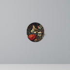 BOTANISK FÅGELSÅNG Oval konsthylla i svart finish