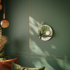 WILDERNESS DASH Rund konsthylla i svart finish