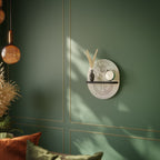 DELIKATE BEAUTY Oval konsthylla i svart finish