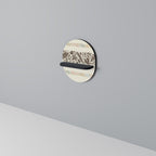 LÖVVERKRADER Oval konsthylla i svart finish