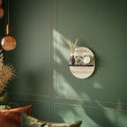 LÖVVERKRADER Oval konsthylla i svart finish