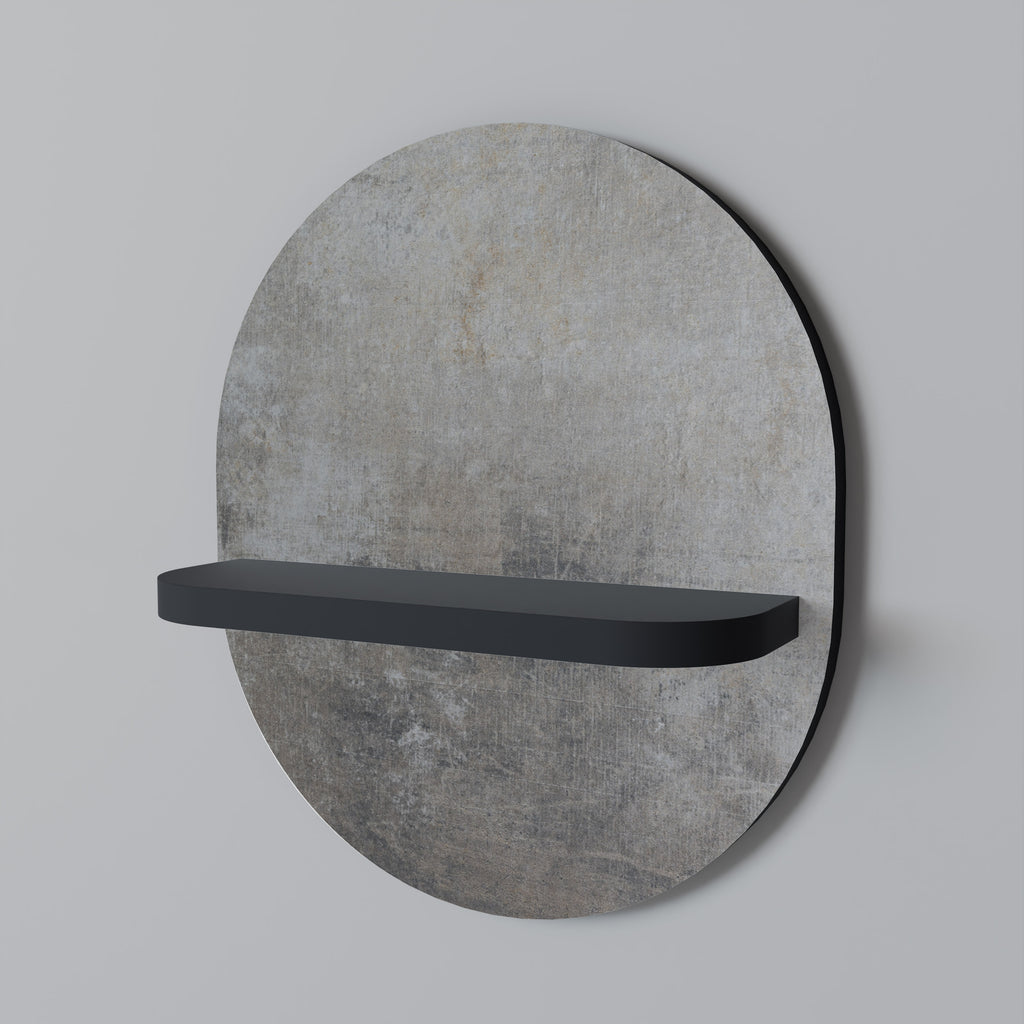 Oval konsthylla i svart finish, betongvägg