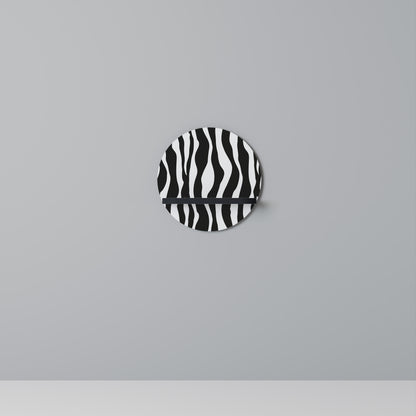 ZEBRA ECHOES Rund konsthylla i svart finish