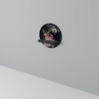 PURE BLOSSOM rund konsthylla i svart finish