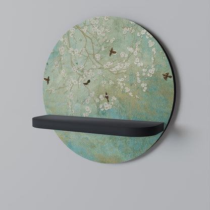 BLOMMANDE CHARM Rund konsthylla i svart finish