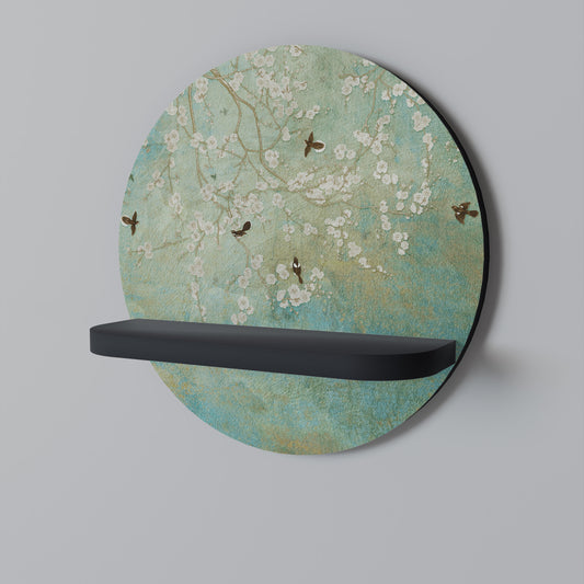 BLOMMANDE CHARM Rund konsthylla i svart finish