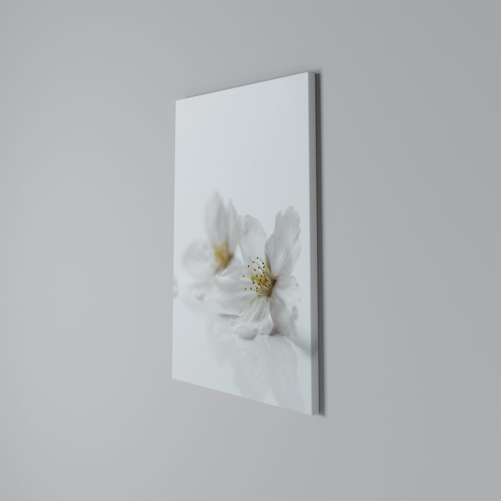 FLEETING WHITE PETALS Vertical Canvas Print