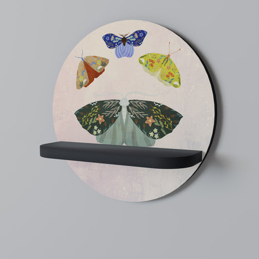 MOTH INTO THE LIGHT Rund konsthylla i svart finish