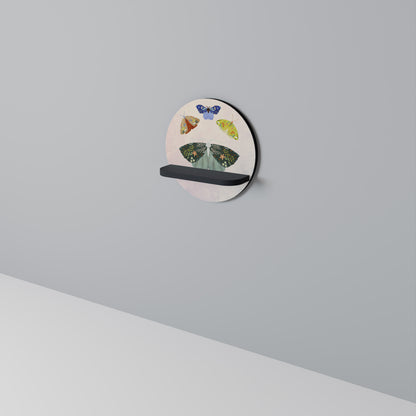 MOTH INTO THE LIGHT Rund konsthylla i svart finish